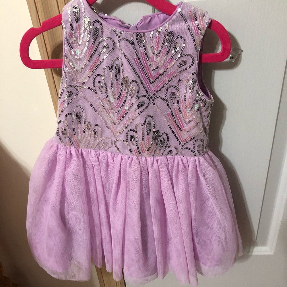 Fancy sequined dress. Bloomers.